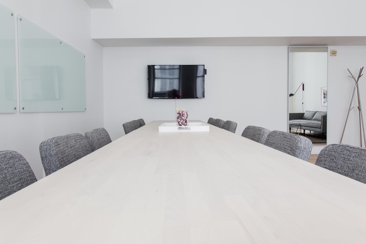 Shanghai conference table with interpreter and business documents